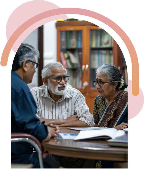 An elderly couple seeking advice from a consultant.